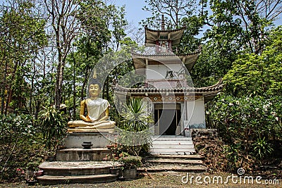 Bhudda and pagoda at Khao Aong Khar temple around Nang Rong, Buriram, Thailand. Stock Photo