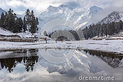 Nanga parbat mountain reflection in lake Karakoram Pakistan Stock Photo