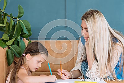 Nanny child artful leisure drawing together Stock Photo