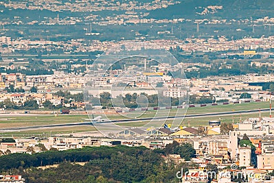 Naples, Italy. Plane Is Landing Or Taking Off At Naples International Airport Stock Photo
