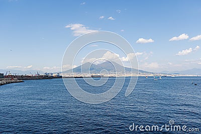 Photograph taken in the city of Naples, Italy, featuring a view of Mount Vesuvius and the Naples sea Stock Photo