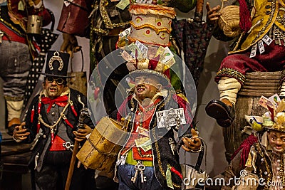 Naples, San Gregorio Armeno, representation in the Neapolitan Presepe of a typical lucky character.Typical Christmas decorations Editorial Stock Photo