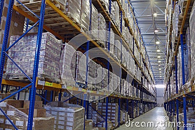 Narrow aisle warehouse with pallet storage system. Editorial Stock Photo