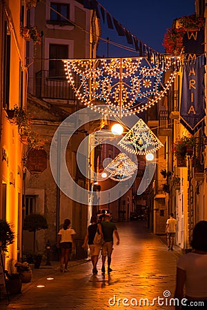 Narrow Alley Lightened at Blue Hour in the CIty of Rotonda, in the South of Italy Editorial Stock Photo