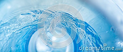 Narrow background with a swirl of blue clear water Stock Photo