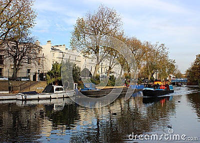 Narrow boat leaving Regent's Canal, Little Venice Editorial Stock Photo