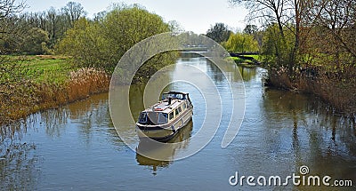 Narrow Boat on the river Great Ouse at St Neots Cambridgeshire England. Stock Photo