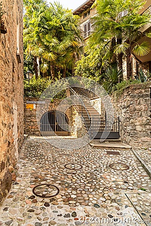 Narrow cobblestone streets in the picturesque village Morcote on the Lake Lugano, Switzerland Stock Photo