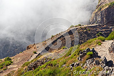 Narrow hiking trails on the mountain Pico do Arieiro. Madeira island Stock Photo