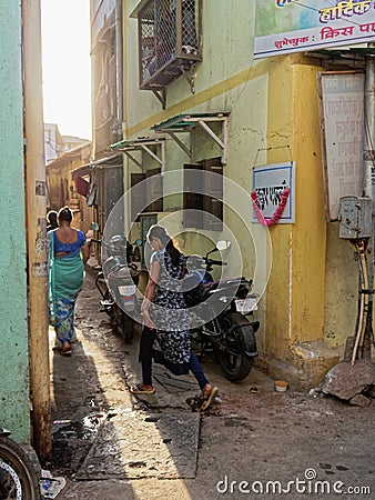 Narrow lane and old house at Worli fisherman`s Village Koliwada Editorial Stock Photo