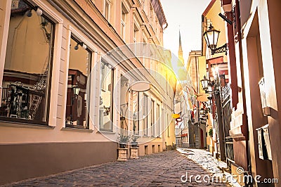 Narrow medieval street in old town Riga - Latvia Stock Photo