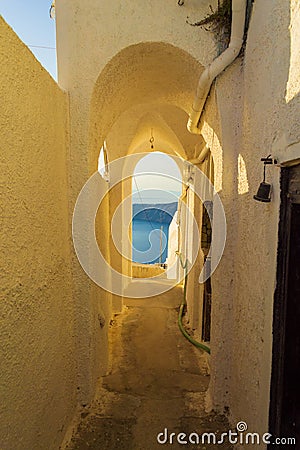 Narrow passageway in Imerovigli village resort Santorini scenery Greece Stock Photo