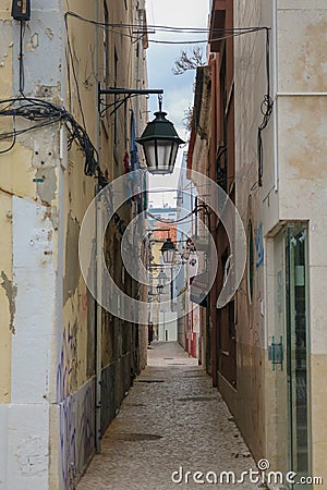 Narrow, quaint street in city Setubal Stock Photo