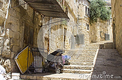 A narrow side street with steps off the Via Dolorosa in Jerusalem Israel Stock Photo