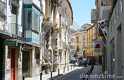 Narrow street of ancient Spanish town Baza Editorial Stock Photo