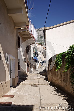 Narrow street in Balkan town Stock Photo