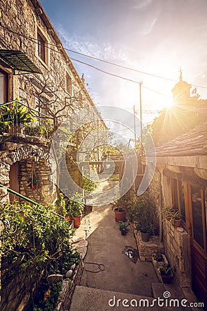 Narrow street of Blato village in Croatia Stock Photo