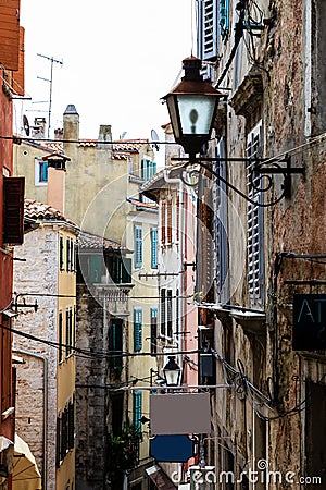 Narrow Street in the City of Rovinj Stock Photo