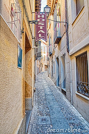 Narrow street in historic Toledo, Spain Stock Photo