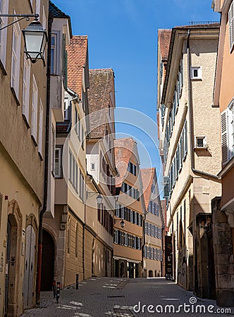 Narrow street in the hsitoric old town of Tuebingen in Germany Editorial Stock Photo
