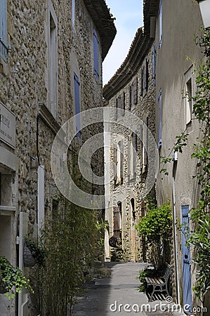 Narrow street, Lourmarin, Vaucluse, Provence-Alpes-CÃ´te d`Azur Stock Photo