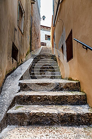 Narrow Street in the Medieval City of Rovinj, Istria Stock Photo