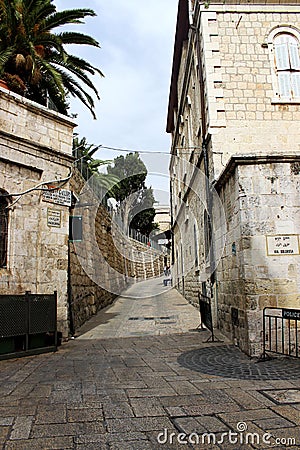 Narrow street of the old city in the center of Jerusalem. Stock Photo