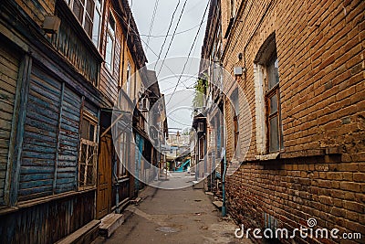 Narrow street in old poverty part of Astrakhan city in Russia Stock Photo