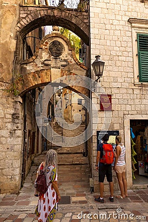 Narrow street, old town of Kotor, Montenegro Editorial Stock Photo