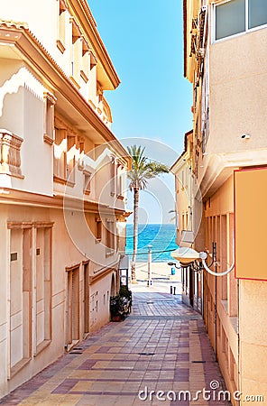 Narrow street of spanish town of El Campello. Stock Photo