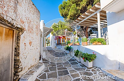 Narrow street with stone houses in Lefkes village Stock Photo