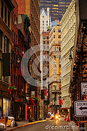 Narrow street of Wall Street District in New York City Stock Photo