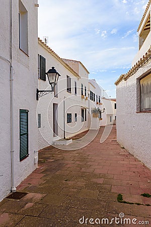 Narrow street, village in Menorca. Spain Stock Photo