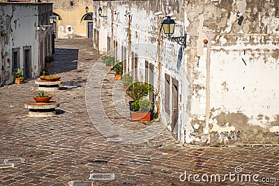 Narrow streets with CCTV security cameras in the old part of Europe Stock Photo