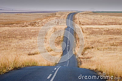 Narrow twining road in the Drakensberg Stock Photo