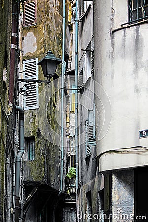 Narrow and very ruined alley Stock Photo