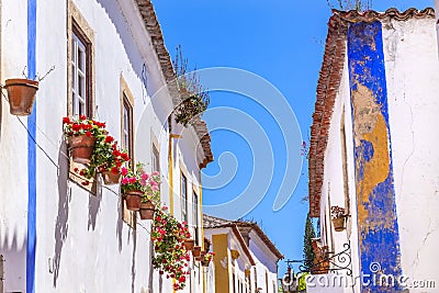 Narrow White Blue Street Obidos Portugal Stock Photo