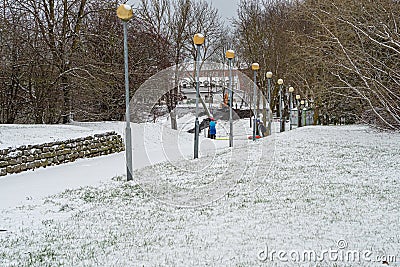 Narva, Estonia. December 23, 2020 Children on sleds Editorial Stock Photo