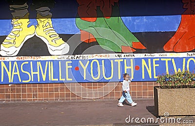 Nashville Youth Network mural with young African American girl in foreground Editorial Stock Photo