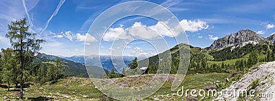 Nassfeld with mountain Gartnerkofel and High Tauern with Grossglockner Stock Photo