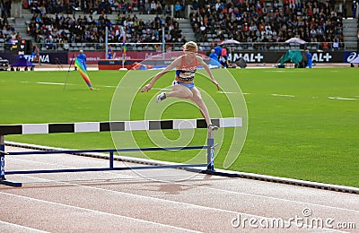 Natalya Aristarkhova from Russia COMPETE on the 3000 meters steeple on DecaNation International Outdoor Games Editorial Stock Photo