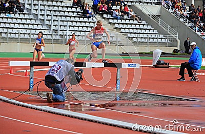 Natalya Aristarkhova from Russia COMPETE on the 3000 meters steeple on DecaNation International Outdoor Games Editorial Stock Photo