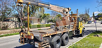 A National Crane 400A Series Boom Truck or crane truck working for the Department of Water and Power Editorial Stock Photo