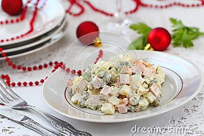 Russian traditional salad Olivier for New Year party Stock Photo