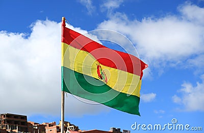 National Flag of the Plurinational State of Bolivia Waving on Sunny Blue Sky, Bolivia Stock Photo