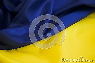 National flag of Ukraine close travel concept silk fabric background Stock Photo