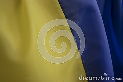 National flag of Ukraine close travel waving silk fabric background Stock Photo