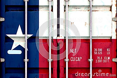 The national flag of the US state Texas in a container doors on the day of independence in different colors of blue red and yellow Stock Photo