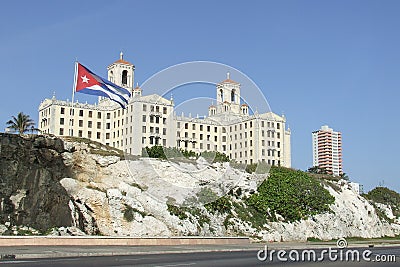 National Hotel and Cuban Flag Stock Photo