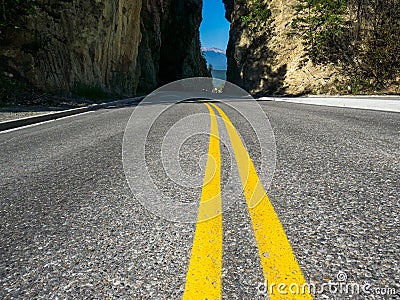 Nice view over the street follow the yellow line Stock Photo